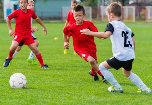 Kids with athletic mouthguards playing sports
